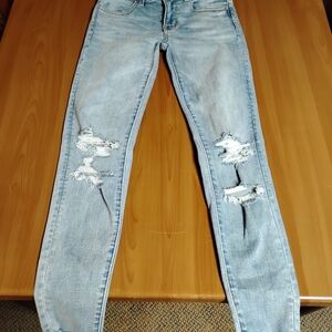 American Eagle Light Blue Ripped Jegging Super Stretch Jeans Size 0 25w
